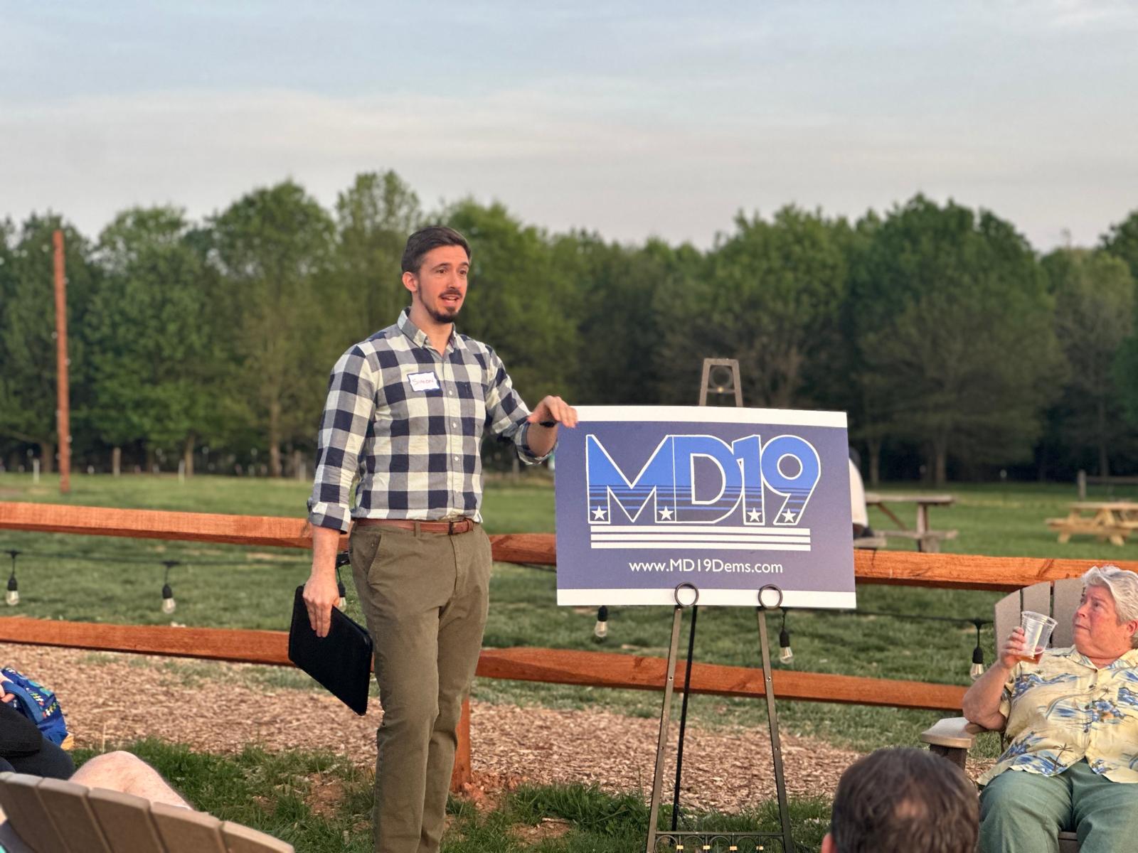 Simon Weaver speaking at a District 19 Democrats event